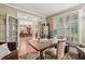 Sunlit office space with French doors leading to the dining room and views of the backyard at 3665 Pennington Rd, Cumming, GA 30041