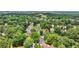An aerial shot showcasing a community with lush trees and winding roads, perfect for those seeking nature at 119 Kennemer Ct, Johns Creek, GA 30097