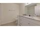 Bathroom featuring a vanity with a granite countertop and a shower/tub combo at 8020 Woodland Ln, Alpharetta, GA 30009