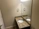 Bathroom featuring a granite countertop vanity, mirror, and modern fixtures at 3140 Tylerton Sw Dr, Atlanta, GA 30311
