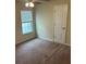 Bright bedroom with a ceiling fan and a window, offering natural light and comfortable living at 3140 Tylerton Sw Dr, Atlanta, GA 30311