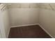 Walk-in closet with carpet and metal shelving for storage at 3140 Tylerton Sw Dr, Atlanta, GA 30311