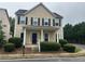 Charming two-story home featuring a front porch, well-manicured landscaping, and a welcoming entrance at 3140 Tylerton Sw Dr, Atlanta, GA 30311