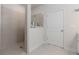 The bathroom features neutral tile in the stand up shower at 3397 Long Creek Drive, Buford, GA 30519
