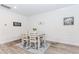 Inviting dining room with modern decor and ample seating at 3397 Long Creek Drive, Buford, GA 30519