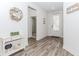 Welcoming entryway with modern decor and hardwood floors at 3397 Long Creek Drive, Buford, GA 30519
