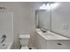 Bathroom featuring a shower-tub combo and a single sink vanity at 4688 Snap Creek Ln, Decatur, GA 30035
