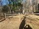 Backyard view of a wood fence surrounding the perimeter of the property at 7592 Watson Kaye, Stone Mountain, GA 30087