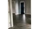 Neutral colored bedroom with wood flooring, large closet and bright window at 7592 Watson Kaye, Stone Mountain, GA 30087