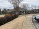 Exterior of community clubhouse next to a play area at 7592 Watson Kaye, Stone Mountain, GA 30087
