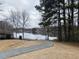 Beautiful lake view with walking path and trees at 7592 Watson Kaye, Stone Mountain, GA 30087