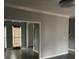 Open concept living room with natural light and wood flooring at 7592 Watson Kaye, Stone Mountain, GA 30087