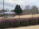 View of community pavilion with mature trees at 7592 Watson Kaye, Stone Mountain, GA 30087