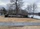 Community playground with swings next to a beautiful lake at 7592 Watson Kaye, Stone Mountain, GA 30087