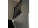 Close up of a staircase showing the painted wood railing and trim at 7592 Watson Kaye, Stone Mountain, GA 30087