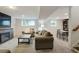 Finished basement area featuring a fireplace, living area, and dining table with chairs at 2640 Spring Se Dr, Smyrna, GA 30080