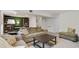 Finished basement with a comfortable seating area, a coffee table, and staircase access at 2640 Spring Se Dr, Smyrna, GA 30080