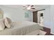 Charming bedroom with hardwood floors and an ensuite bathroom featuring a sliding barn door at 2640 Spring Se Dr, Smyrna, GA 30080