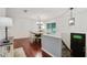 Bright dining area featuring hardwood floors, a dining table with seating for six, and modern lighting at 2640 Spring Se Dr, Smyrna, GA 30080