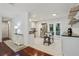 Modern kitchen with stainless steel appliances, white cabinetry, and a view of the backyard at 2640 Spring Se Dr, Smyrna, GA 30080