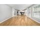 Open-concept living area with hardwood floors and easy access to the kitchen at 4188 Cookcreek Place Northwest Nw Pl, Lilburn, GA 30047