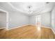 Spacious main bedroom with a decorative tray ceiling and natural light at 4188 Cookcreek Place Northwest Nw Pl, Lilburn, GA 30047