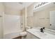 Bathroom featuring a tub, toilet, vanity, and a mirror at 4593 Parkway Cir, Atlanta, GA 30349