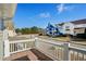 Front porch featuring wooden decking with neighborhood view at 4593 Parkway Cir, Atlanta, GA 30349