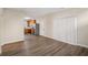 The living room boasts wood floors, sliding glass doors, and access to the kitchen at 4593 Parkway Cir, Atlanta, GA 30349