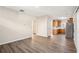 The living room includes wood floors, and an open layout into the kitchen and dining spaces at 4593 Parkway Cir, Atlanta, GA 30349