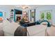 Bright living room with a cozy fireplace, built-in shelving, and access to the outdoor with neutral walls at 7060 Summit Ridge Chase, Cumming, GA 30041