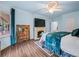 This lovely primary bedroom has a fireplace, television, and access to the outdoors at 7060 Summit Ridge Chase, Cumming, GA 30041