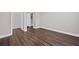 Bedroom with neutral paint, hardwood floors, and access to a large closet at 840 United Avenue Southeast # 401, Atlanta, GA 30312