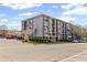 Exterior showcases well-maintained landscaping, an appealing facade, and convenient street access for residents at 840 United Avenue Southeast # 401, Atlanta, GA 30312