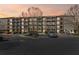 Stylish condo building with balconies, beautiful landscaping, and ample parking for residents and guests at 840 United Avenue Southeast # 401, Atlanta, GA 30312