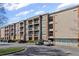 Attractive condominium building featuring a nice exterior, private balconies, and a convenient parking area at 840 United Avenue Southeast # 401, Atlanta, GA 30312