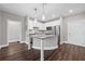 Modern kitchen featuring a spacious island, stainless steel appliances, and sleek white cabinetry for a stylish look at 840 United Avenue Southeast # 401, Atlanta, GA 30312