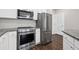 Well-equipped kitchen features stainless steel appliances and granite countertops at 840 United Avenue Southeast # 401, Atlanta, GA 30312