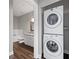 Stacked washer and dryer set conveniently located near the bathroom at 840 United Avenue Southeast # 401, Atlanta, GA 30312