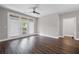 Bright living room with modern ceiling fan and access to outdoor patio at 840 United Avenue Southeast # 401, Atlanta, GA 30312