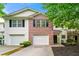 Charming townhouse with brick accents, attached garage, and inviting curb appeal in a desirable neighborhood at 89 Prospect Path, Hiram, GA 30141