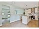 Modern kitchen featuring an island, stainless steel appliances, and a convenient breakfast bar at 191 Pine Ne St, Fairburn, GA 30213