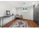 Finished basement with hardwood floors and recessed lighting at 2020 New Kemp Rd, Marietta, GA 30066