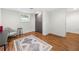 Finished basement area with hardwood floors, an area rug, and neutral decor at 2020 New Kemp Rd, Marietta, GA 30066