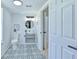 Bathroom featuring a modern vanity, stylish mirror, and designer floor tile at 259 Tarragon Sw Way, Atlanta, GA 30331