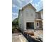Two-story home with open garage, modern design, and spacious layout at 31 Benscot Dr, Austell, GA 30106