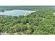 Beautiful aerial view of the property with lake and lush greenery surrounding the area at 386 Link Rd, Alpharetta, GA 30022