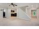 Open basement featuring stairs, kitchen area, and access to the backyard at 386 Link Rd, Alpharetta, GA 30022