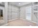 Walk-in closet with wire shelving and natural light from a window at 386 Link Rd, Alpharetta, GA 30022
