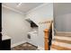 Convenient laundry room with tile flooring, washer, dryer, and storage cabinets at 386 Link Rd, Alpharetta, GA 30022